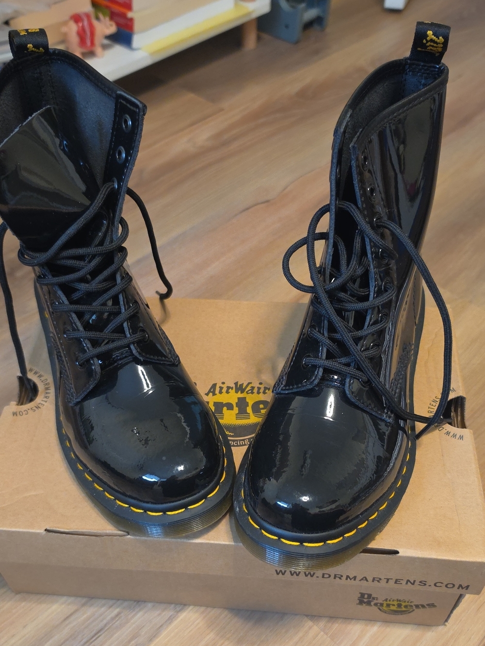 Dr. Martens Black Patent Lace-Up Combat Boots with Yellow Stitching